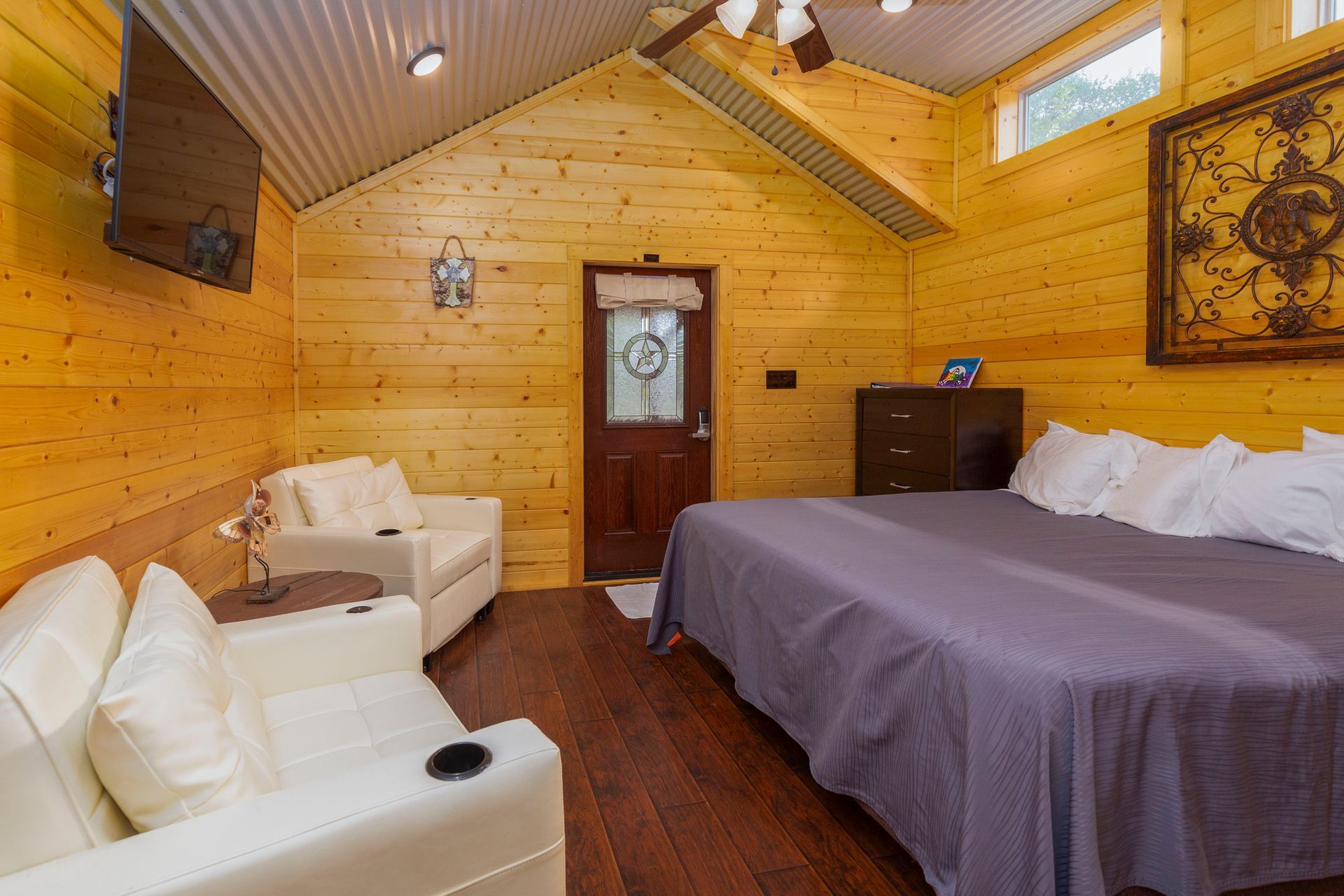 There is a large bed in the middle of the room.