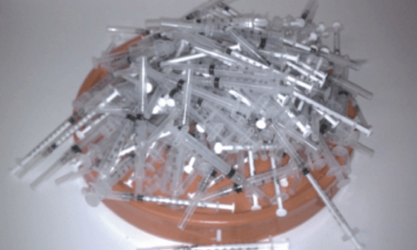 200 Syringe Remnants From Sharps Container