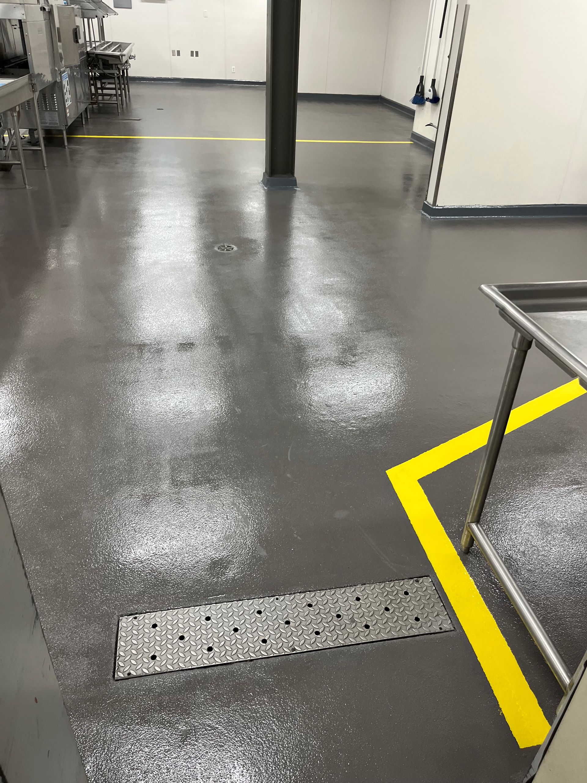 There is a yellow line on the floor in the middle of the room.