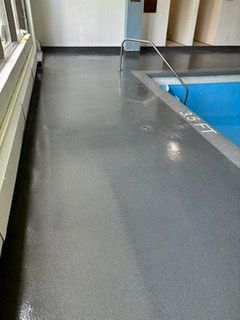 There is a swimming pool in the middle of the room.