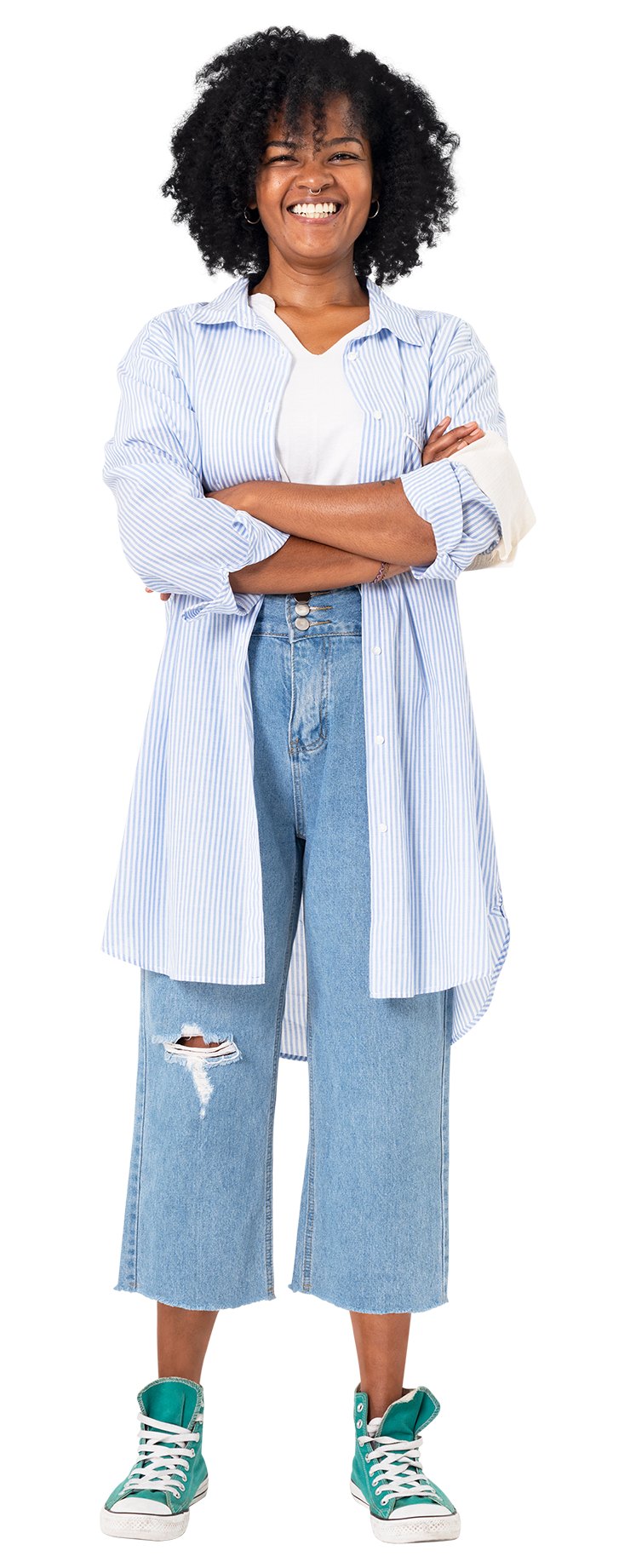 a woman standing with her arms crossed and smiling