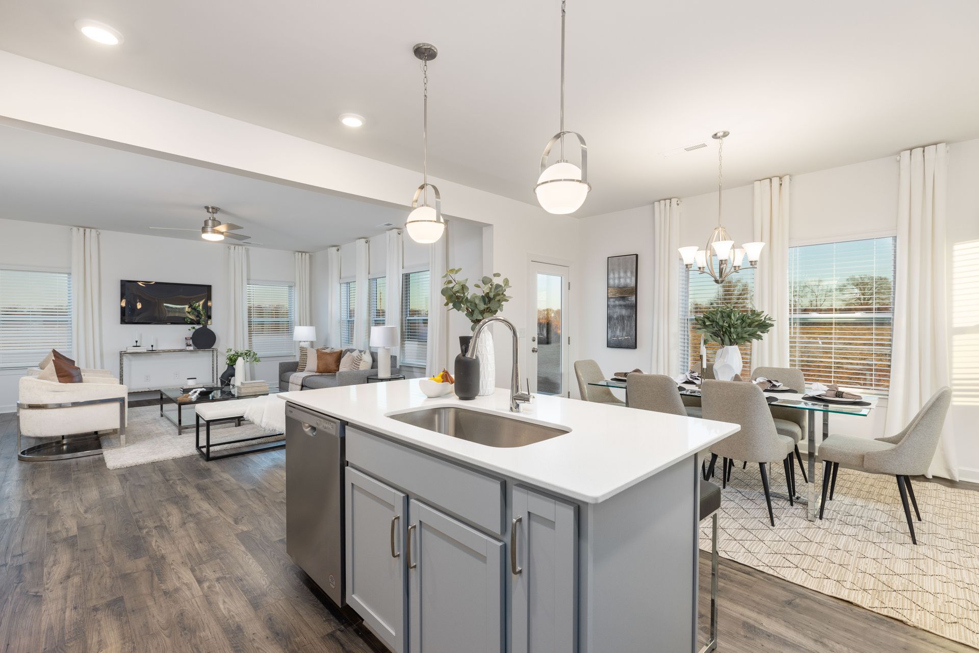 A kitchen with a large island in the middle of the room.