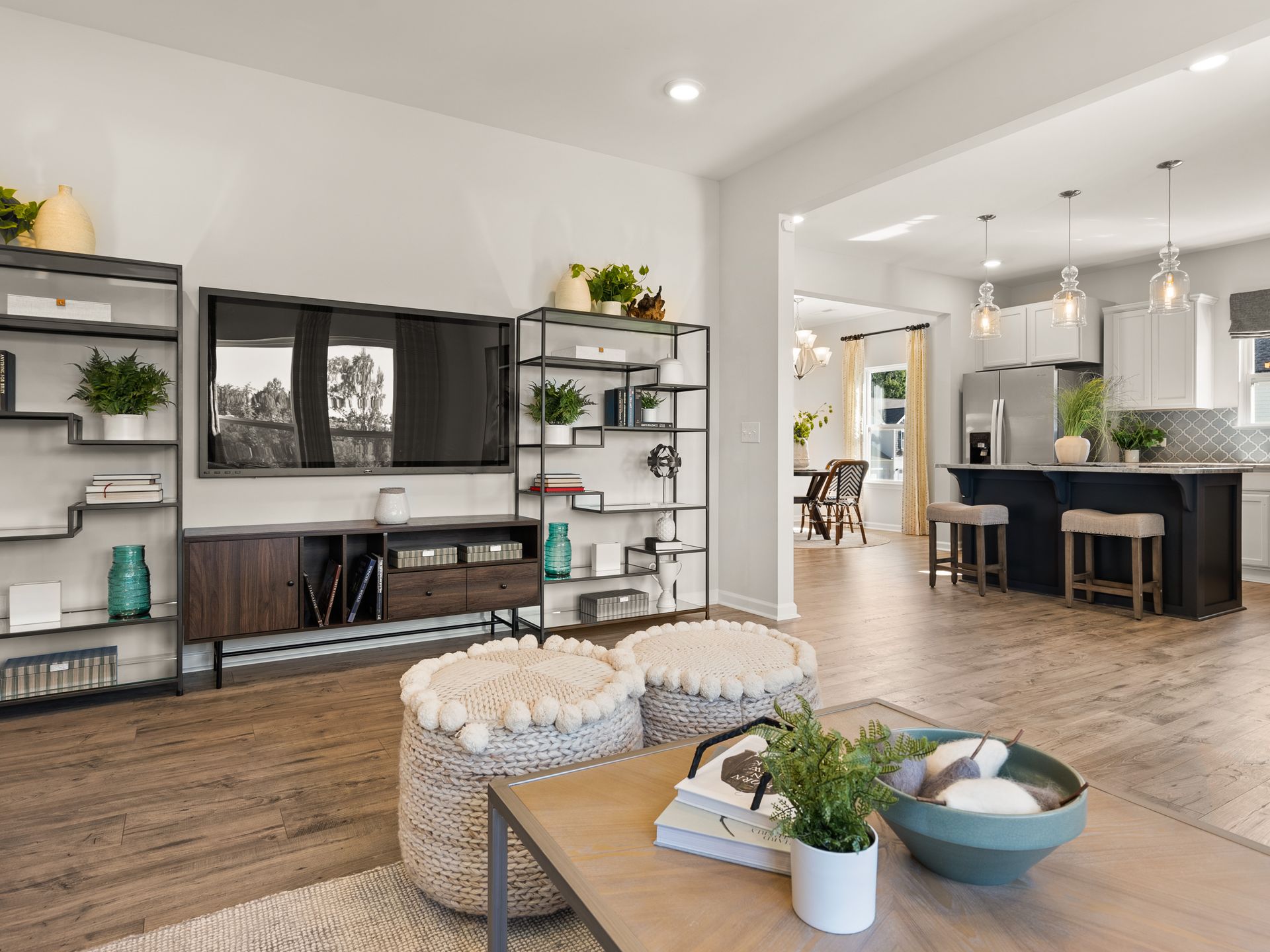 A living room filled with furniture and a flat screen tv.