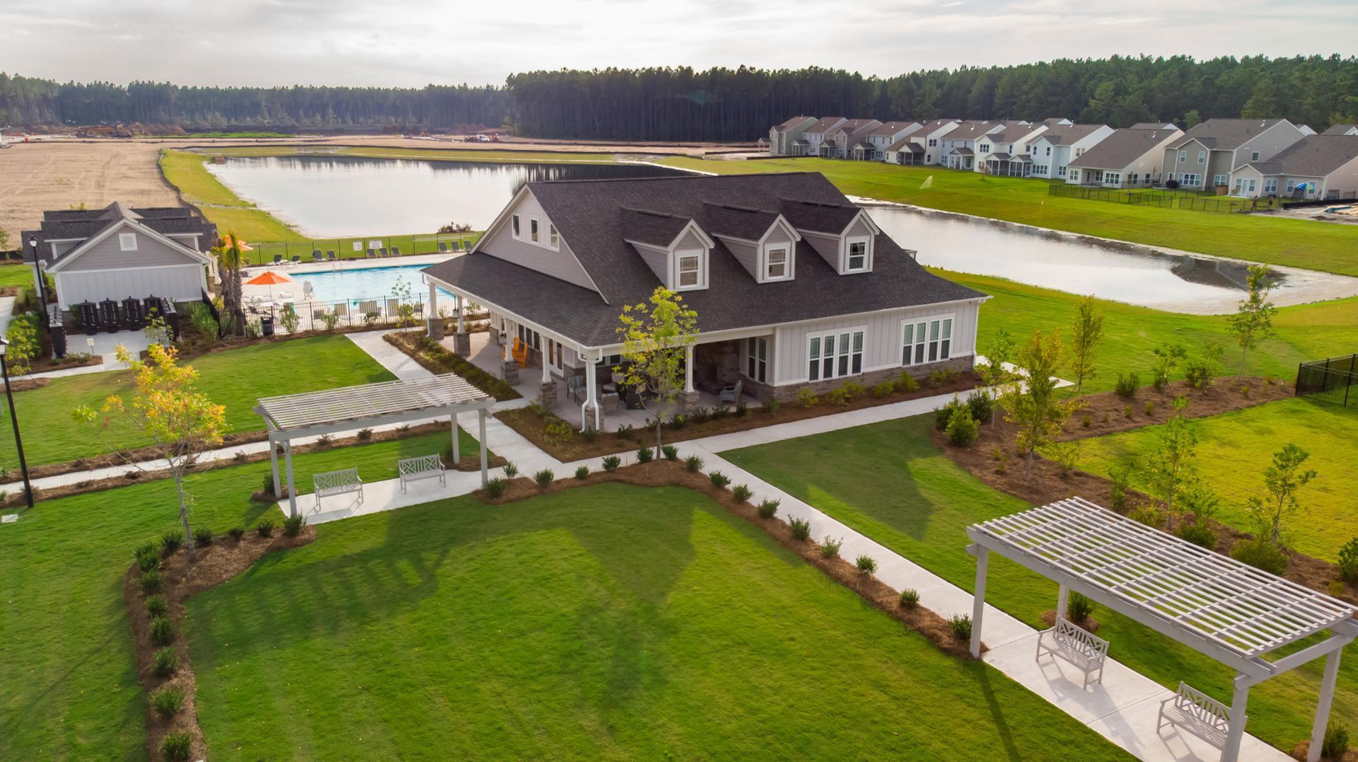 an aerial view of a club house in a residential area
