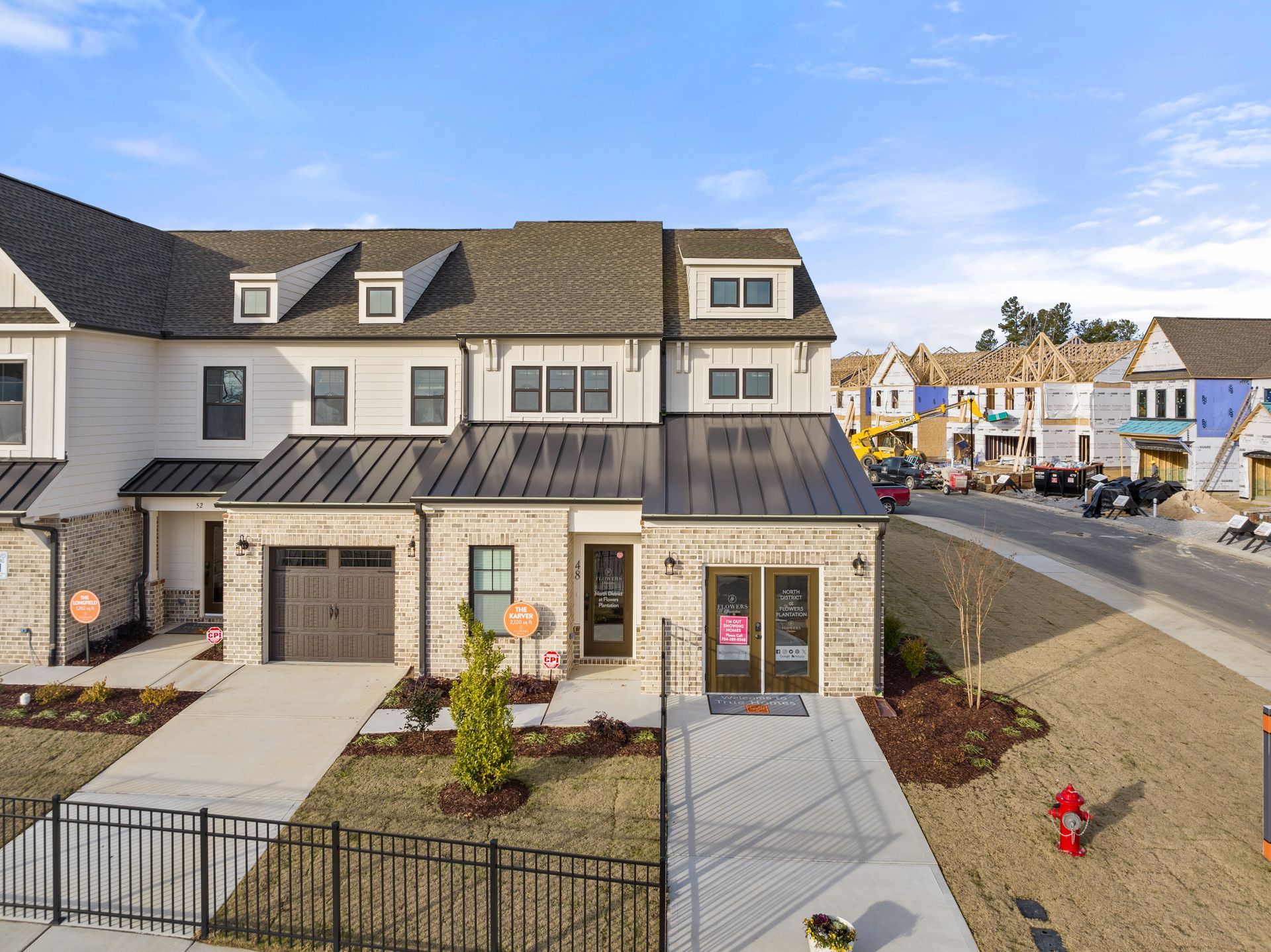 an aerial view of a house in a residential area with a fire hydrant in front of it .