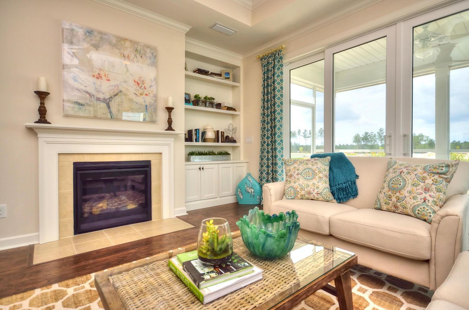 A living room with a fireplace and a couch