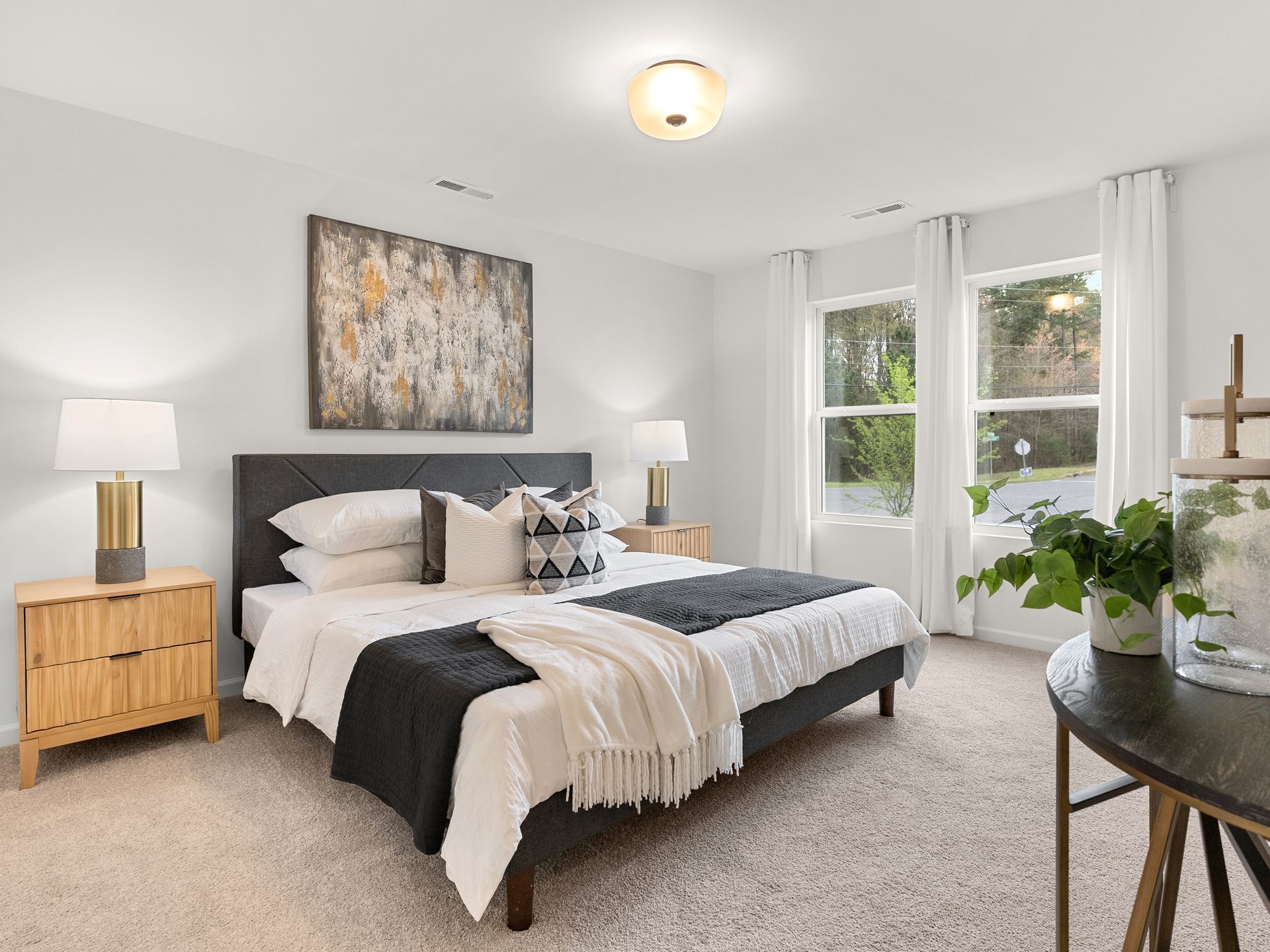 There is a large bed in the middle of the room.