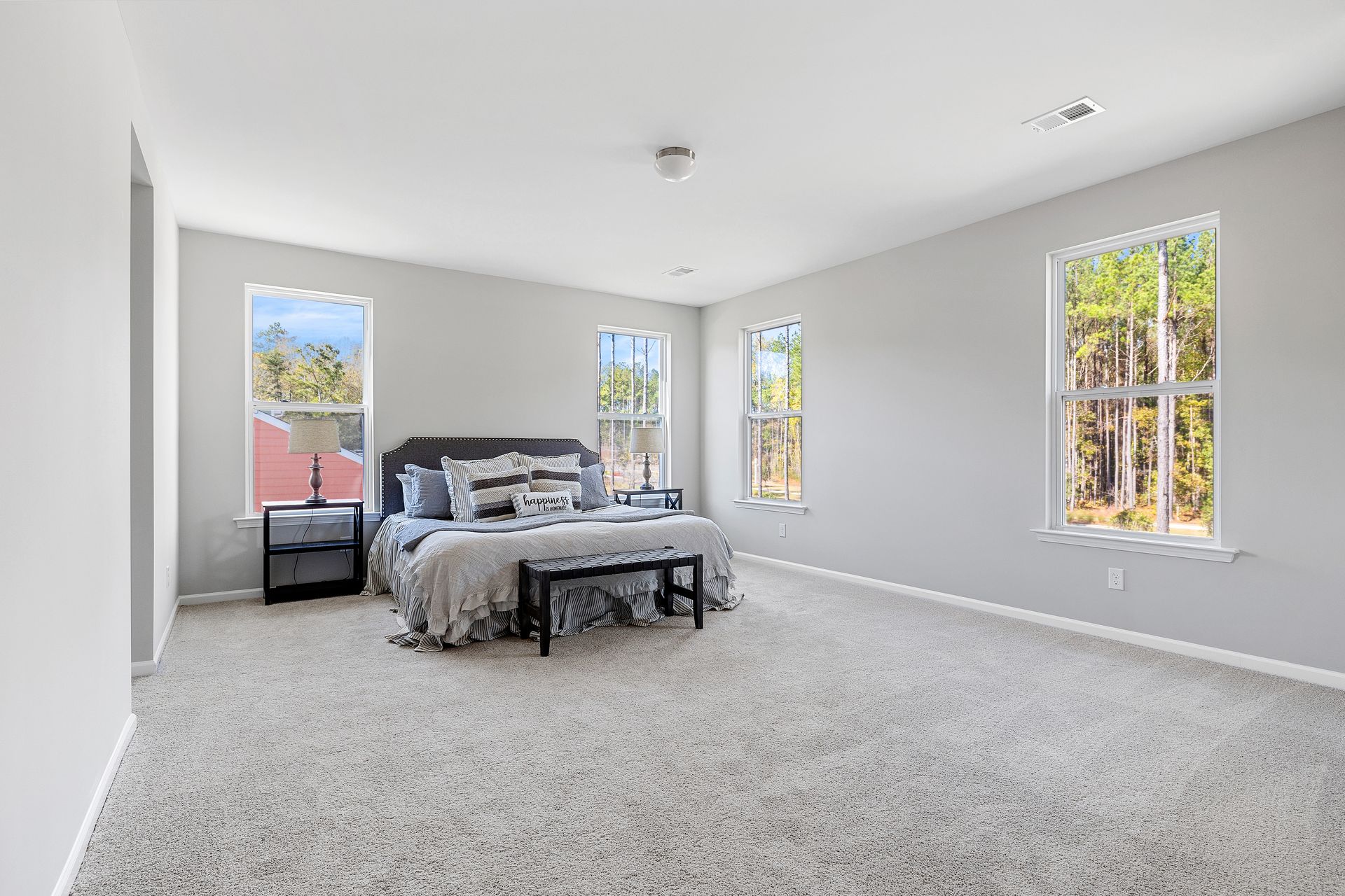 There is a large bed in the middle of the room.