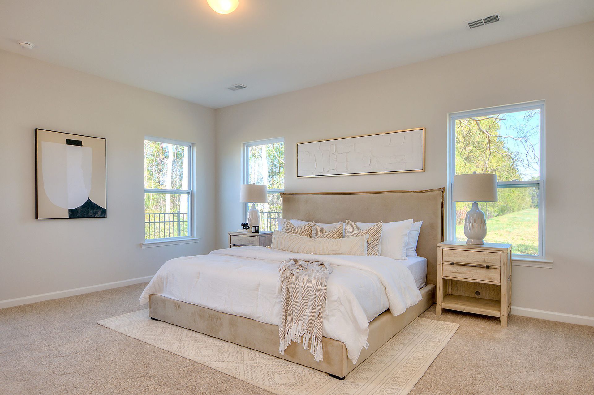 There is a large bed in the middle of the room.