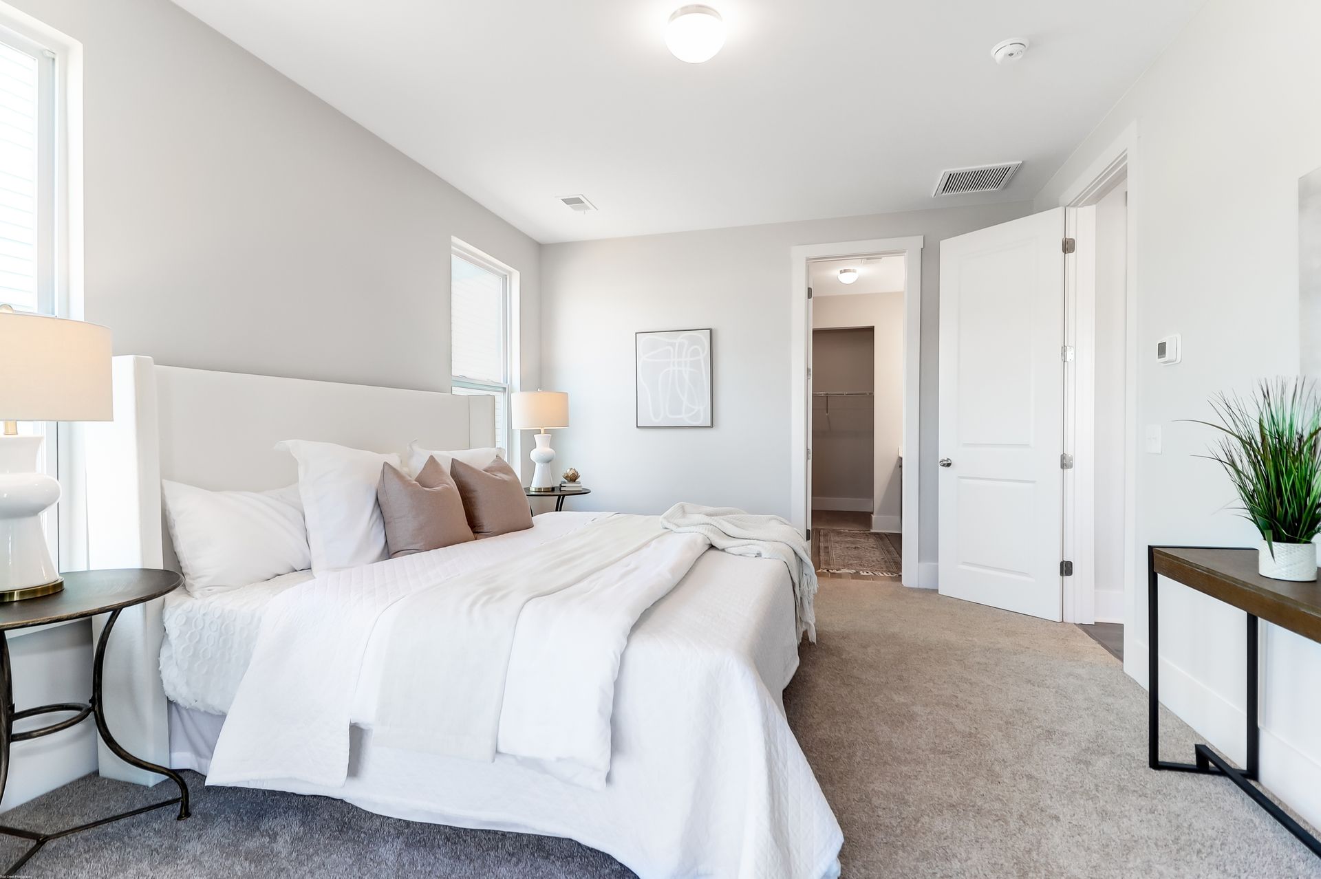 There is a large bed in the middle of the room.