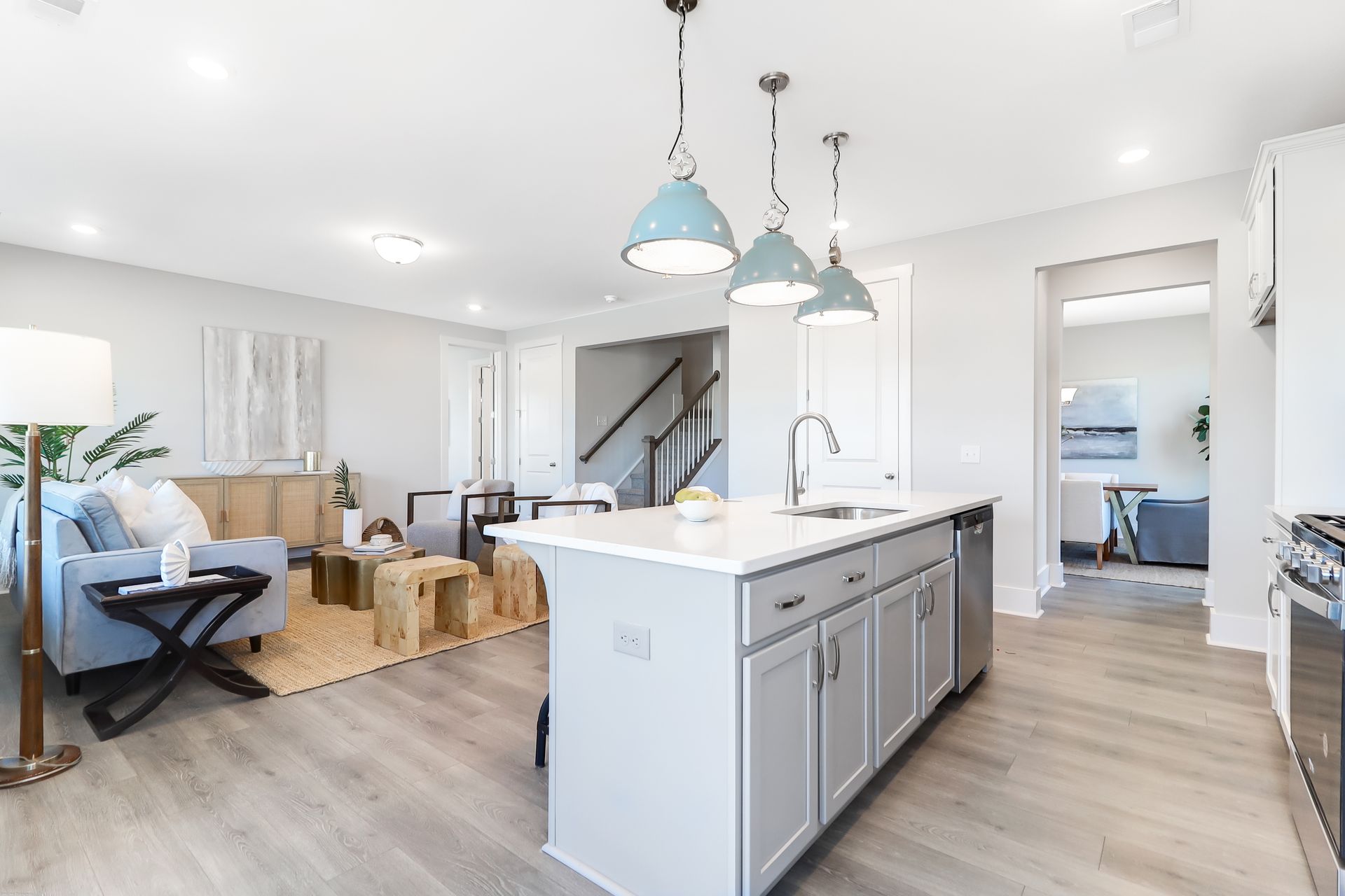 A kitchen with a large island in the middle of the room.