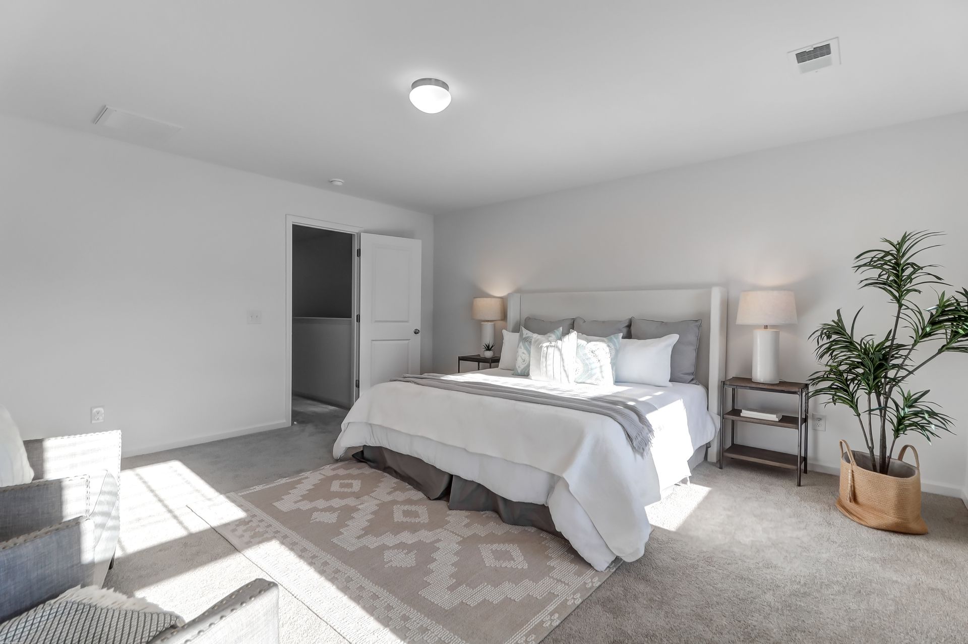 There is a large bed in the middle of the room.