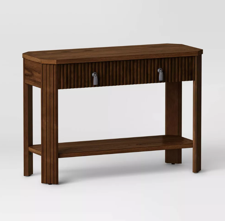 A wooden table with two drawers and a shelf on a white background.