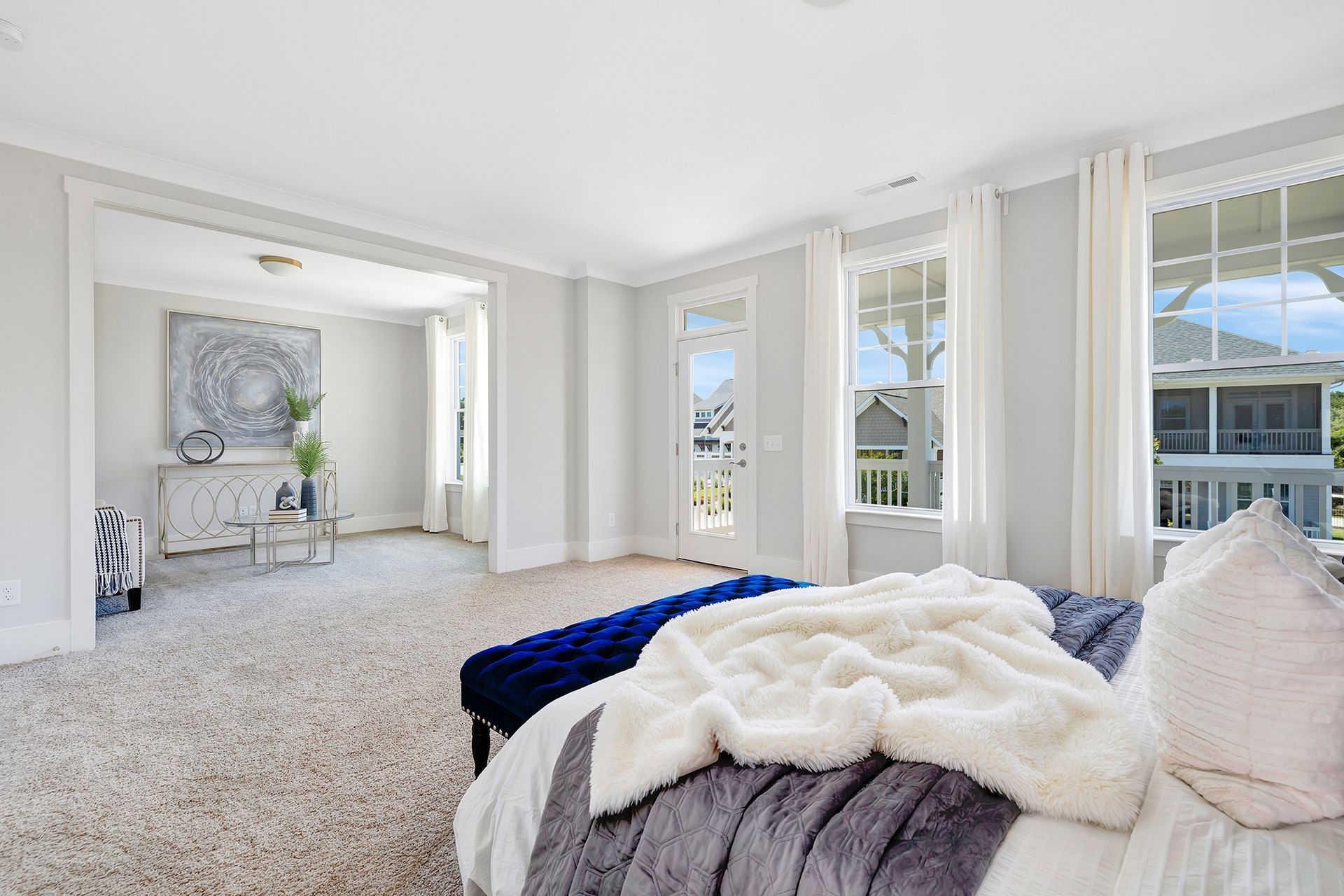 There is a large bed in the middle of the room.