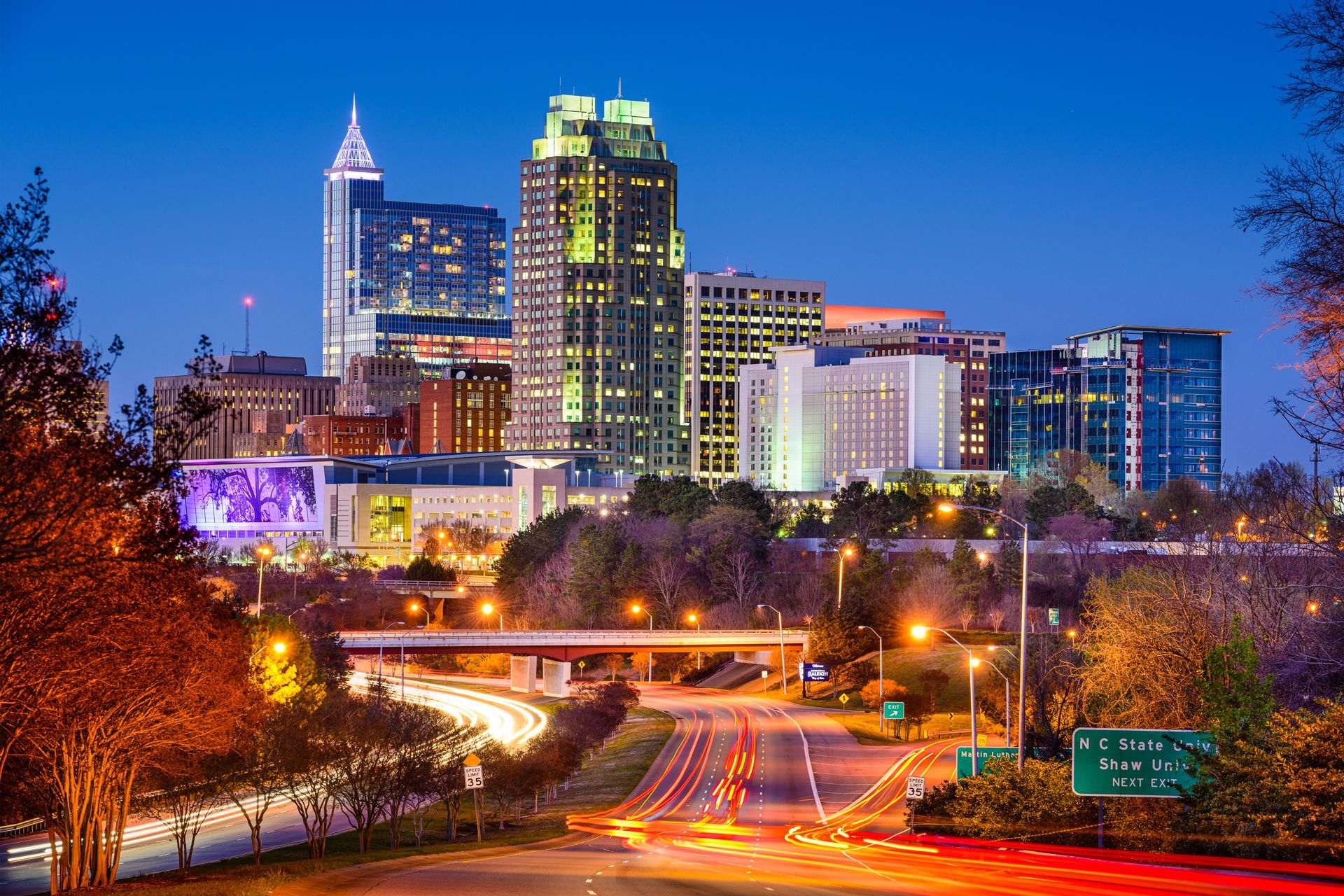 Raleigh city skyline with a white building in the foreground