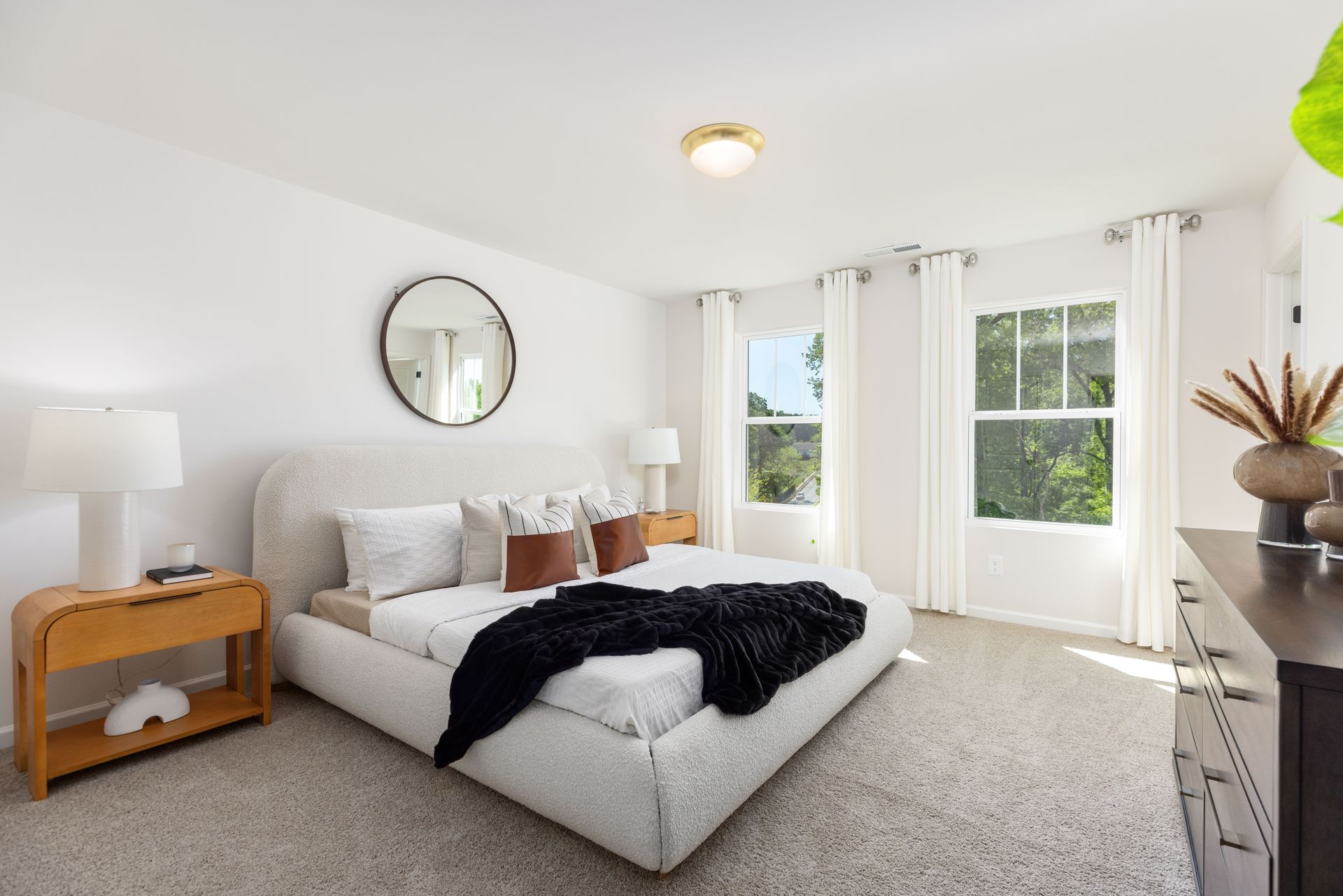 There is a large bed in the middle of the room.