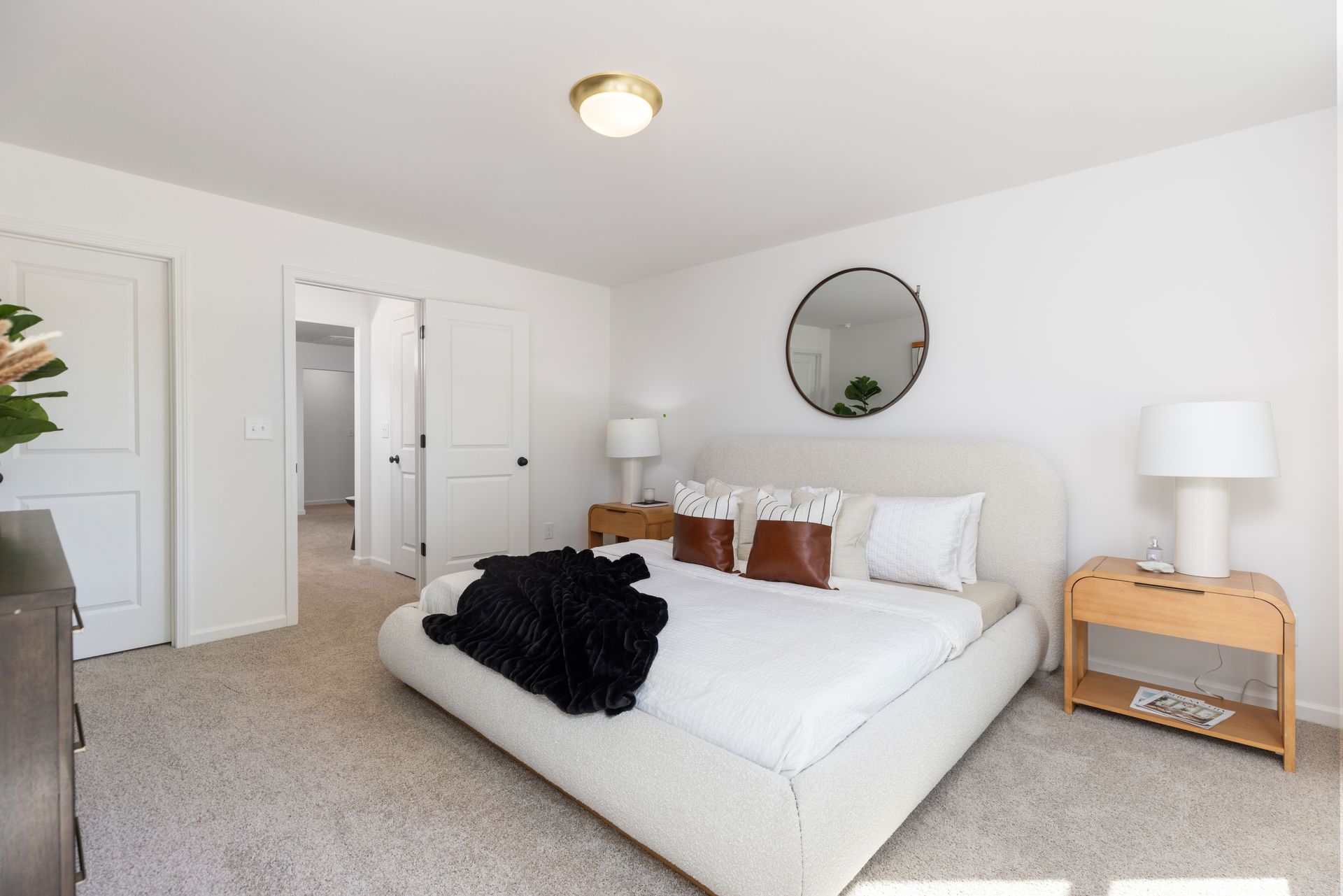 There is a large bed in the middle of the room.