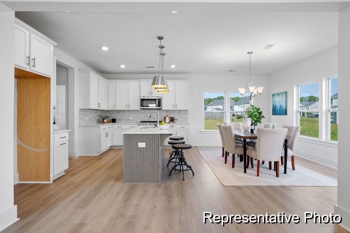 It is a representative photo of a kitchen and dining room.
