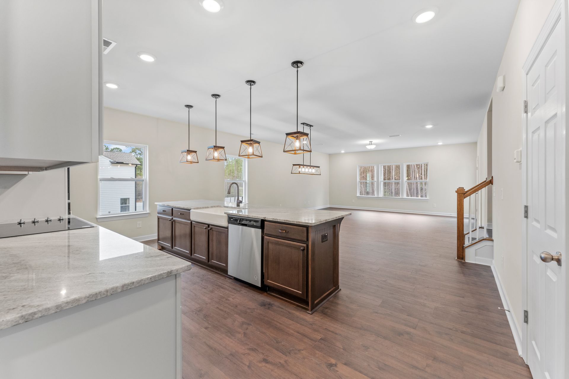 A kitchen with a large island in the middle of the room.