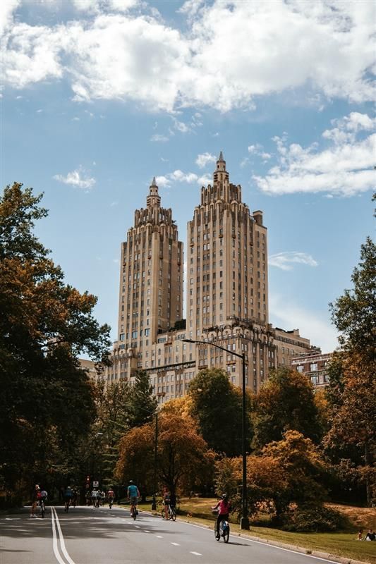 A tall building with a theater below.