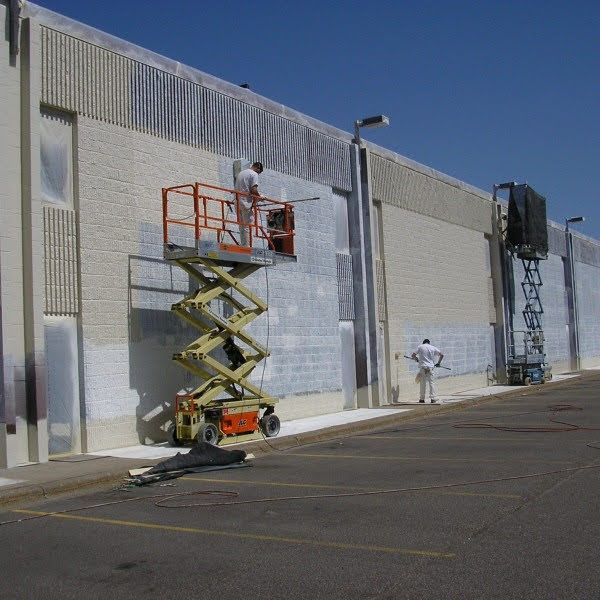 Man Painting the Wall - Schaumburg, IL - Trend Painting and Decorating Inc