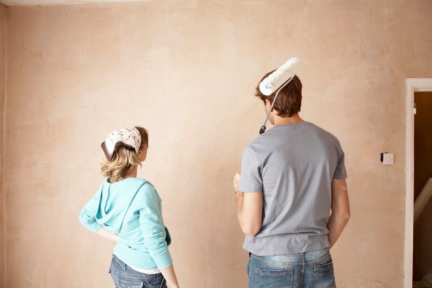 Couple Painting Wall — Schaumburg, IL — Trend Painting And Decorating Inc