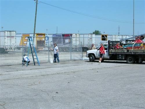 People working on a fence