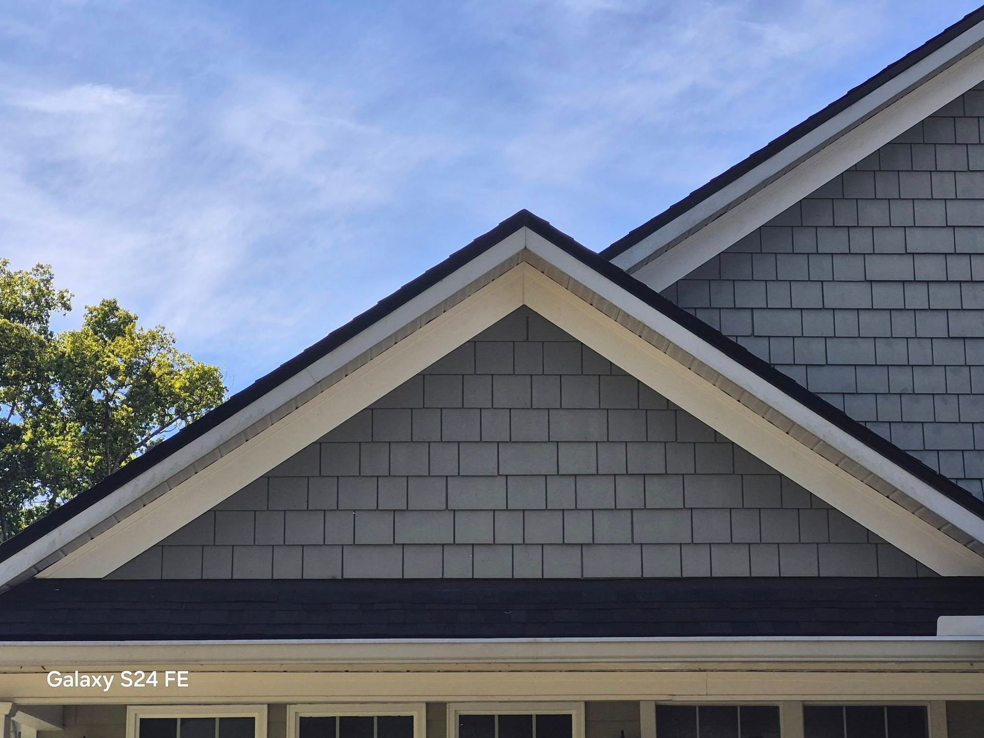 The roof of a house has a triangle shaped roof