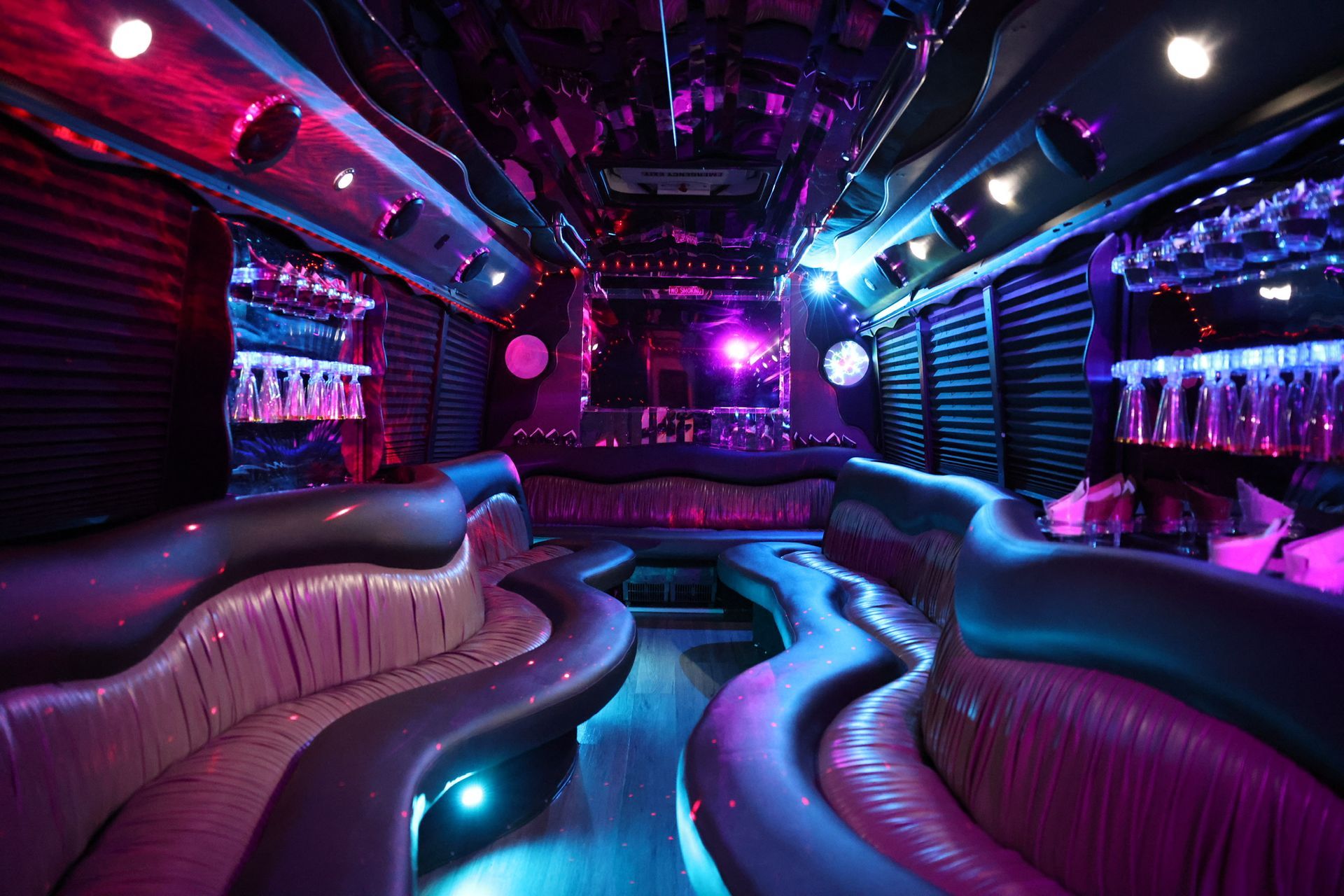 the inside of a sprinter with many leather seats