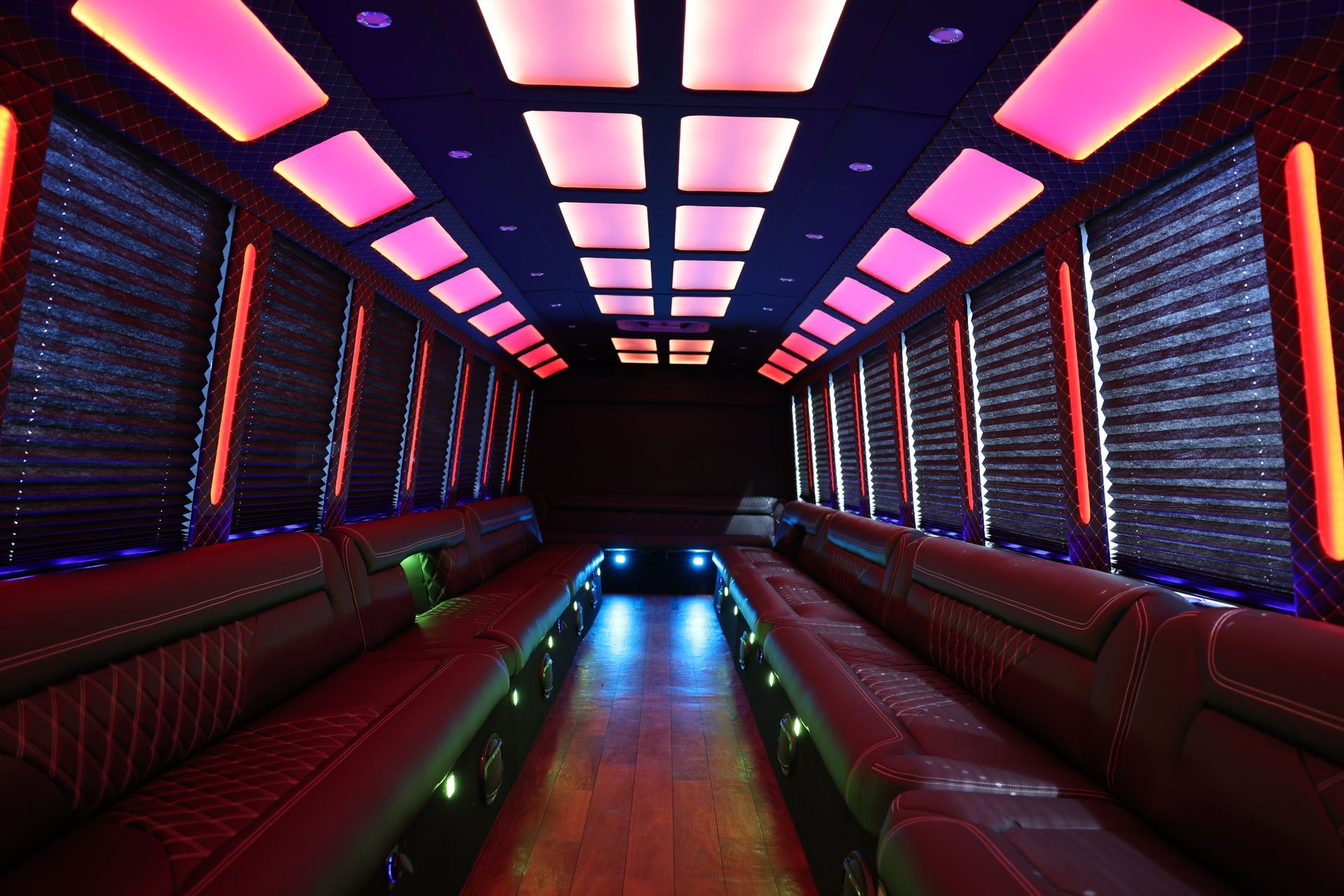 the inside of a sprinter with many leather seats