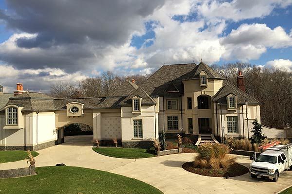 A Large White House — Akron, OH — D&M Roofing LLC