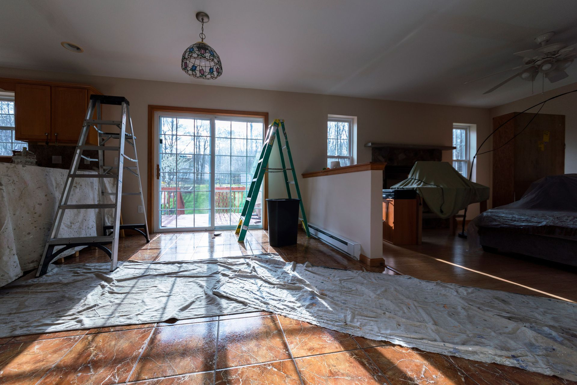 There is a ladder in the middle of the room.