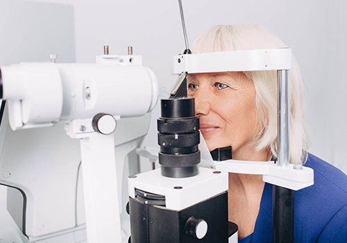 Senior Woman Receiving Eye Exam — Danvers, MA — North Shore Eye Specialists Senior Woman Receiving Eye Exam — Danvers, MA — North Shore Eye Specialists