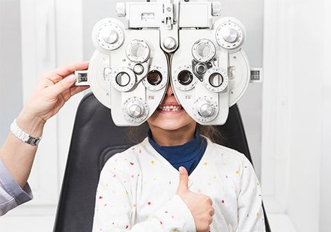Girl Shows Thumb Up at an Ophthalmologist — Danvers, MA — North Shore Eye Specialists