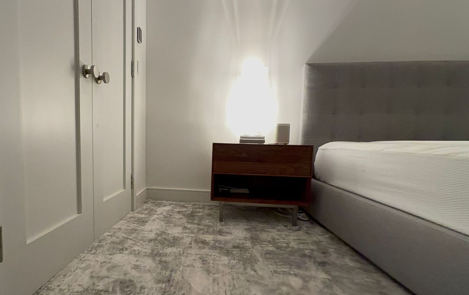 A bunch of wooden boards are stacked on top of each other on a table.