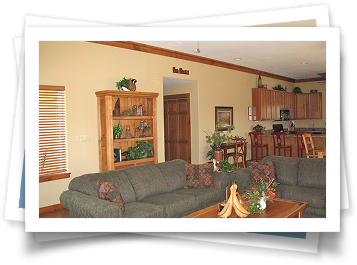 A living room with a couch and a coffee table