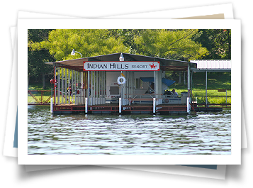 A dock with a sign that says indian hills resort