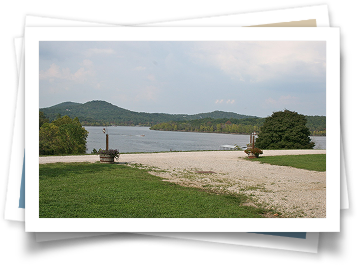 A picture of a lake with mountains in the background