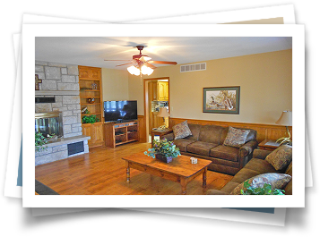 A living room with a couch and a coffee table