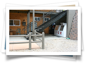 A picture of a building with stairs and an ice machine