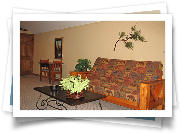 A living room with a couch and a coffee table