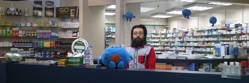 Man behind the counter of Dunedin's trusted pharmacy