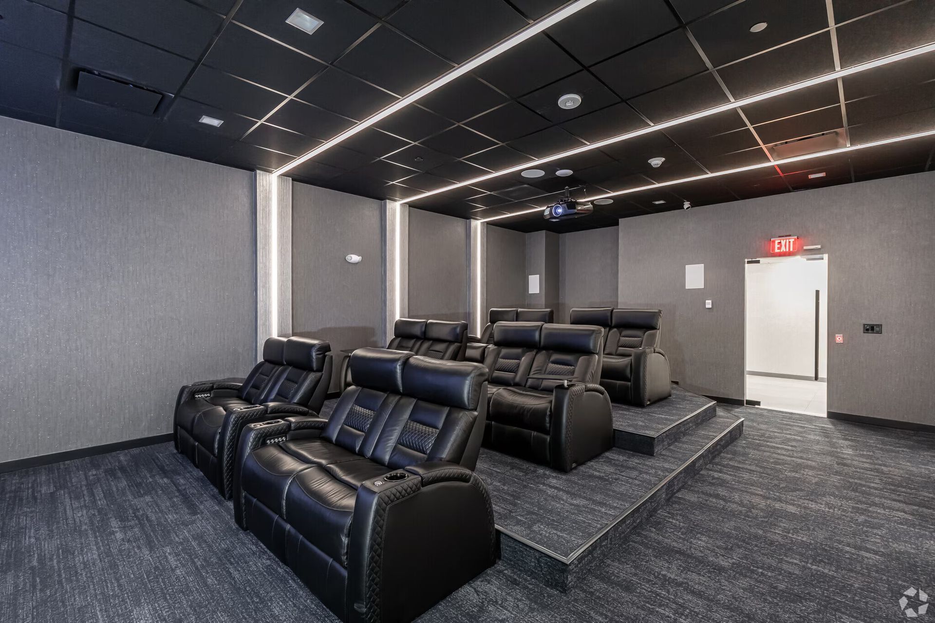Private movie theater with reclining seats at The Millennium apartments in Hartford