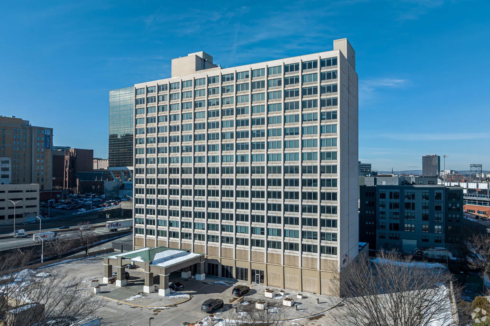 Street-level exterior view of The Millennium apartments in Hartford