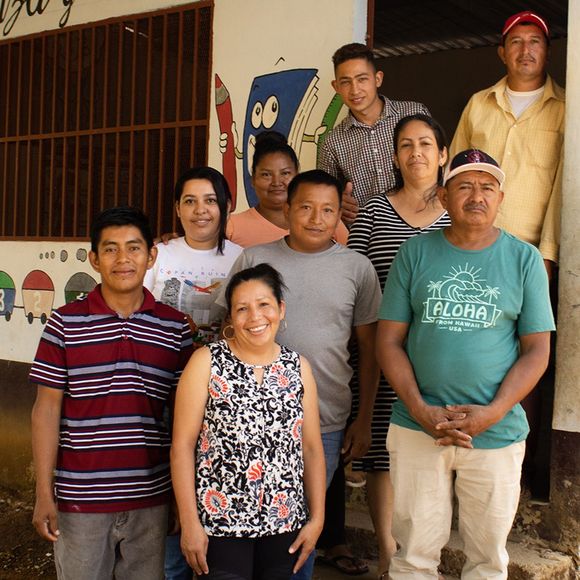 A group of Hondurans in a classroom.