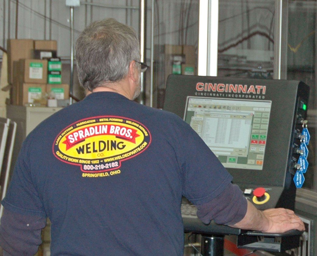 Laser Equipment - Man operating the laser equipment in Springfield, OH