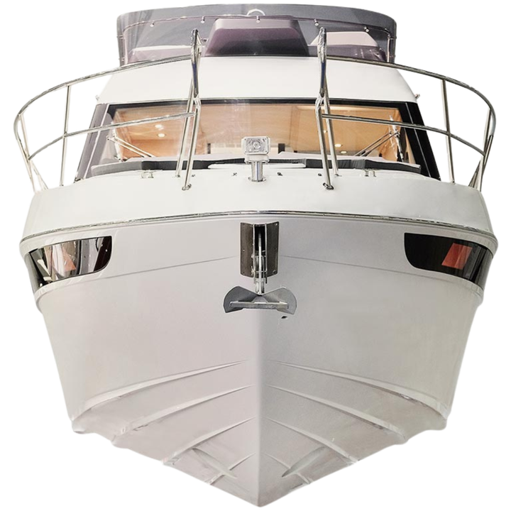 The front of a white boat with a propeller