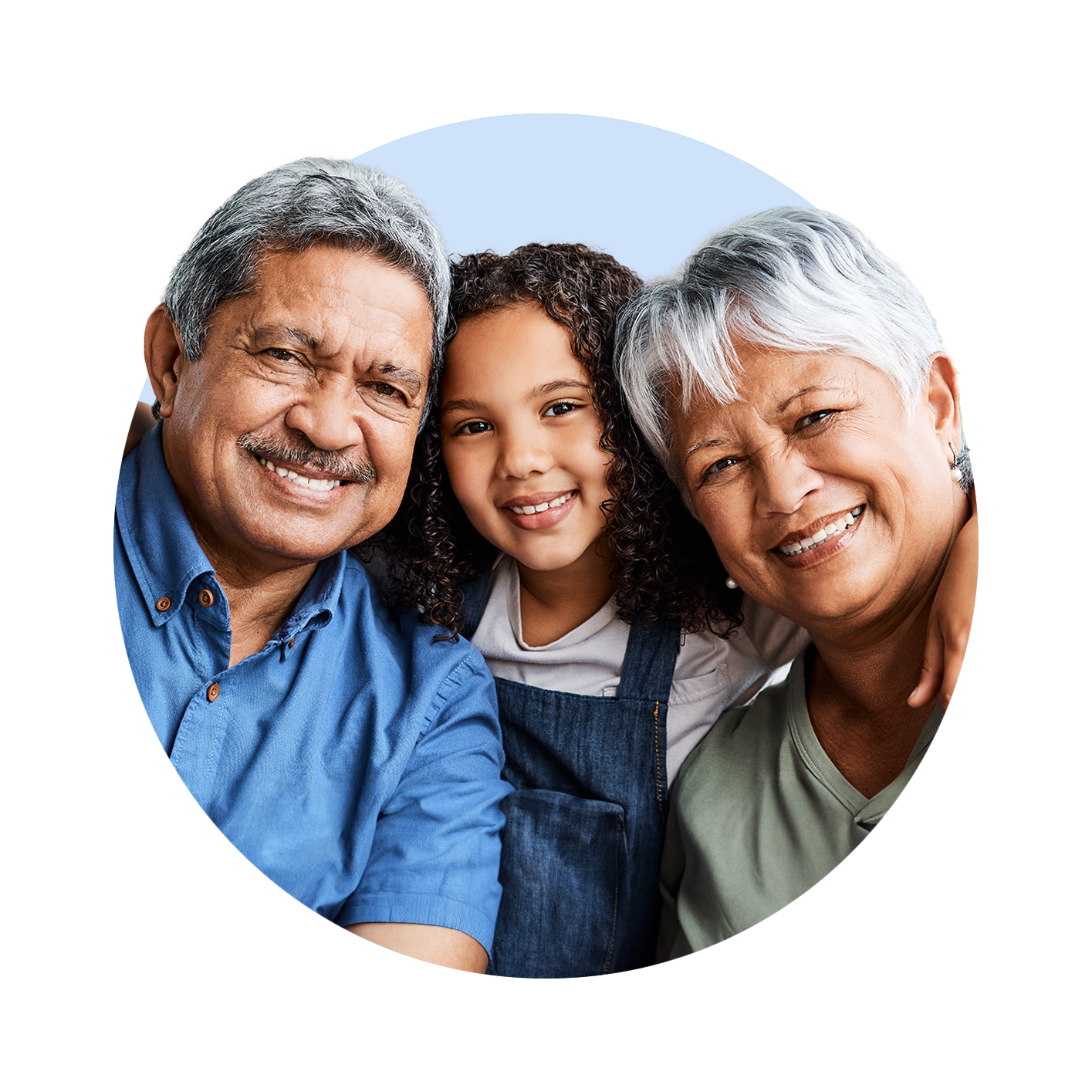 An elderly couple and granddaughter are posing for a picture together.