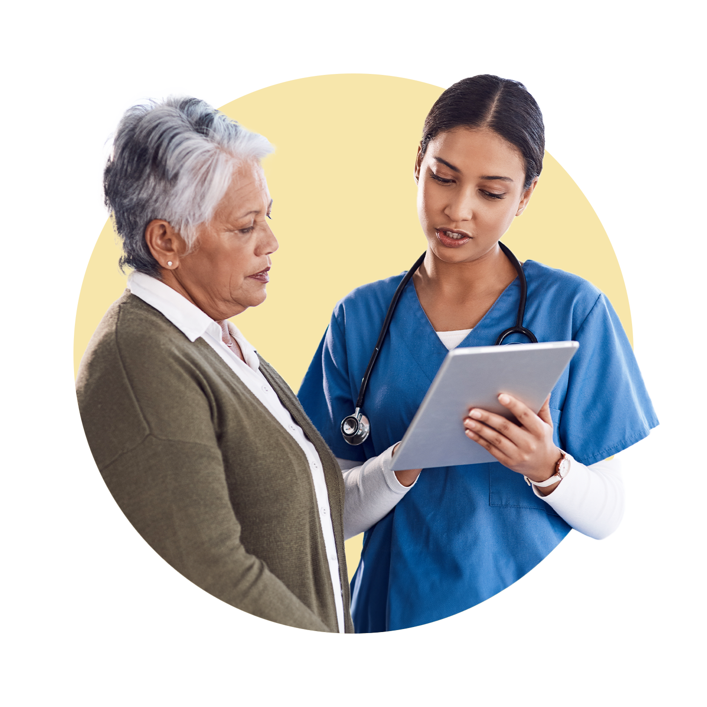 Nurse holding ipad discussing with patient