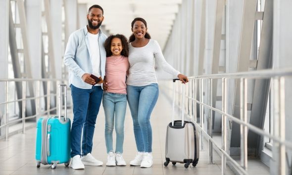 A white car icon with a shadow on a white background.